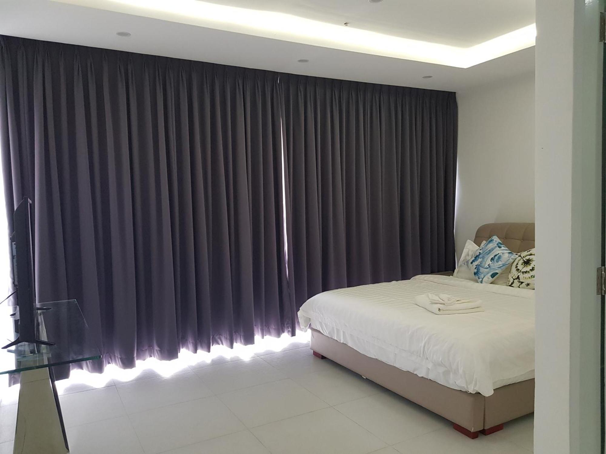 אולונגפו Chequers Suites Subic Bay מראה חיצוני תמונה